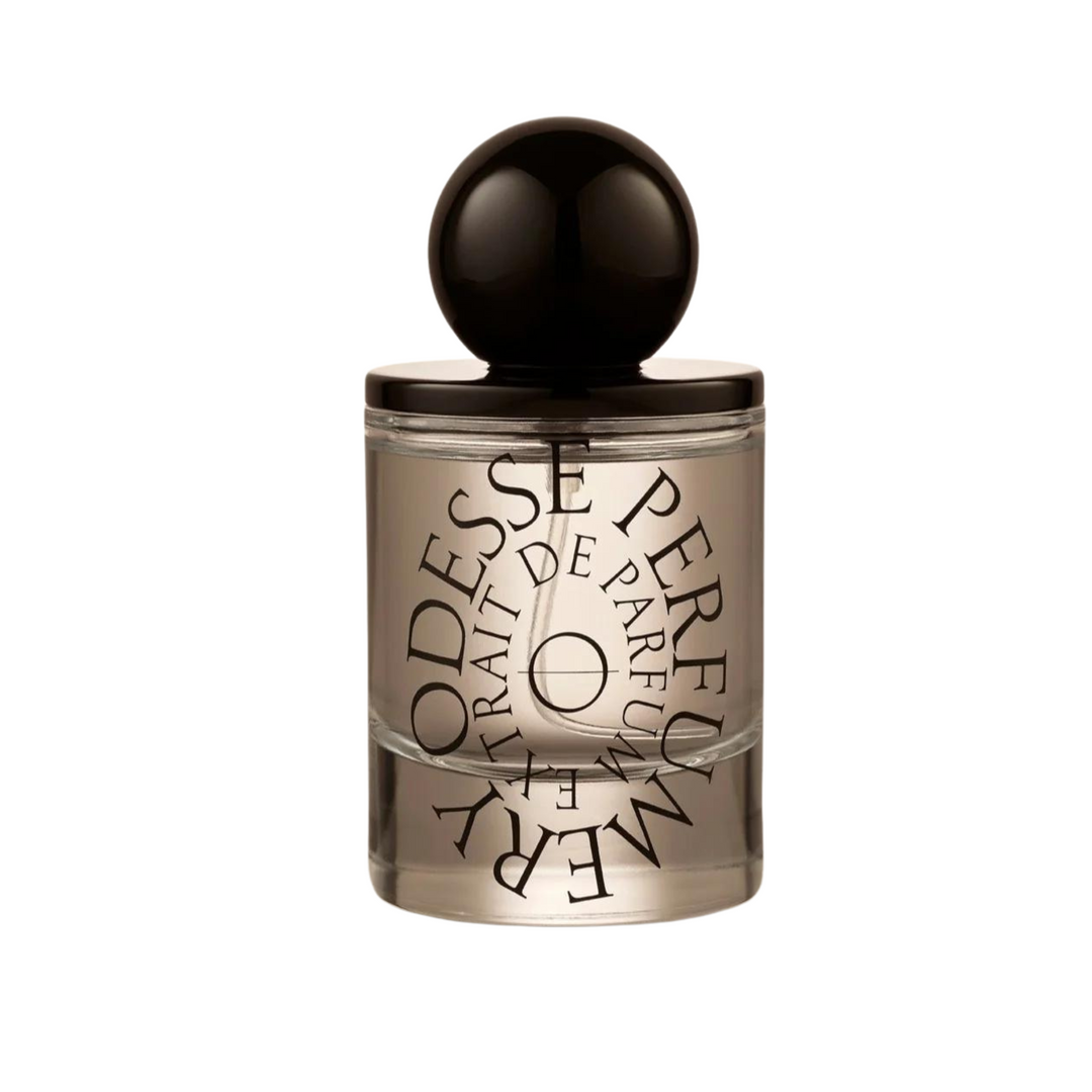 A sophisticated Odesse perfume bottle, with a dark, spherical cap, against a neutral backdrop, luxury fragrance in Australia.