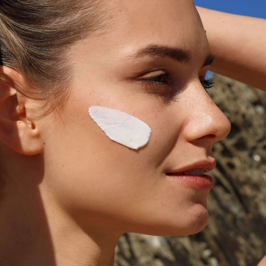 Woman wearing mineral sunscreen SPF 30 from Avocado Zinc Australia shop from VAMS Beauty