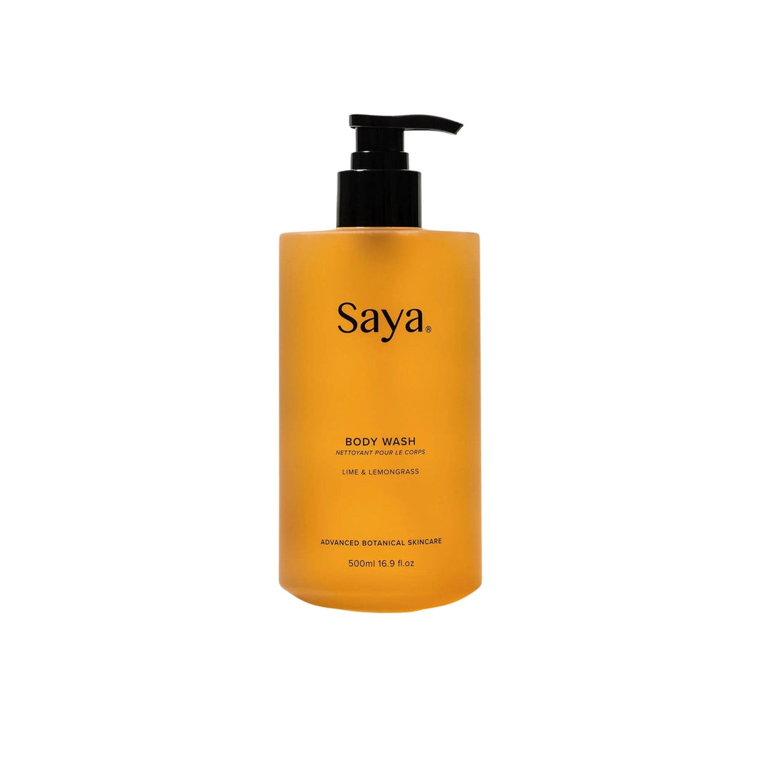 Orange bottle of Saya Skincare all natural body wash with a pump on a white background