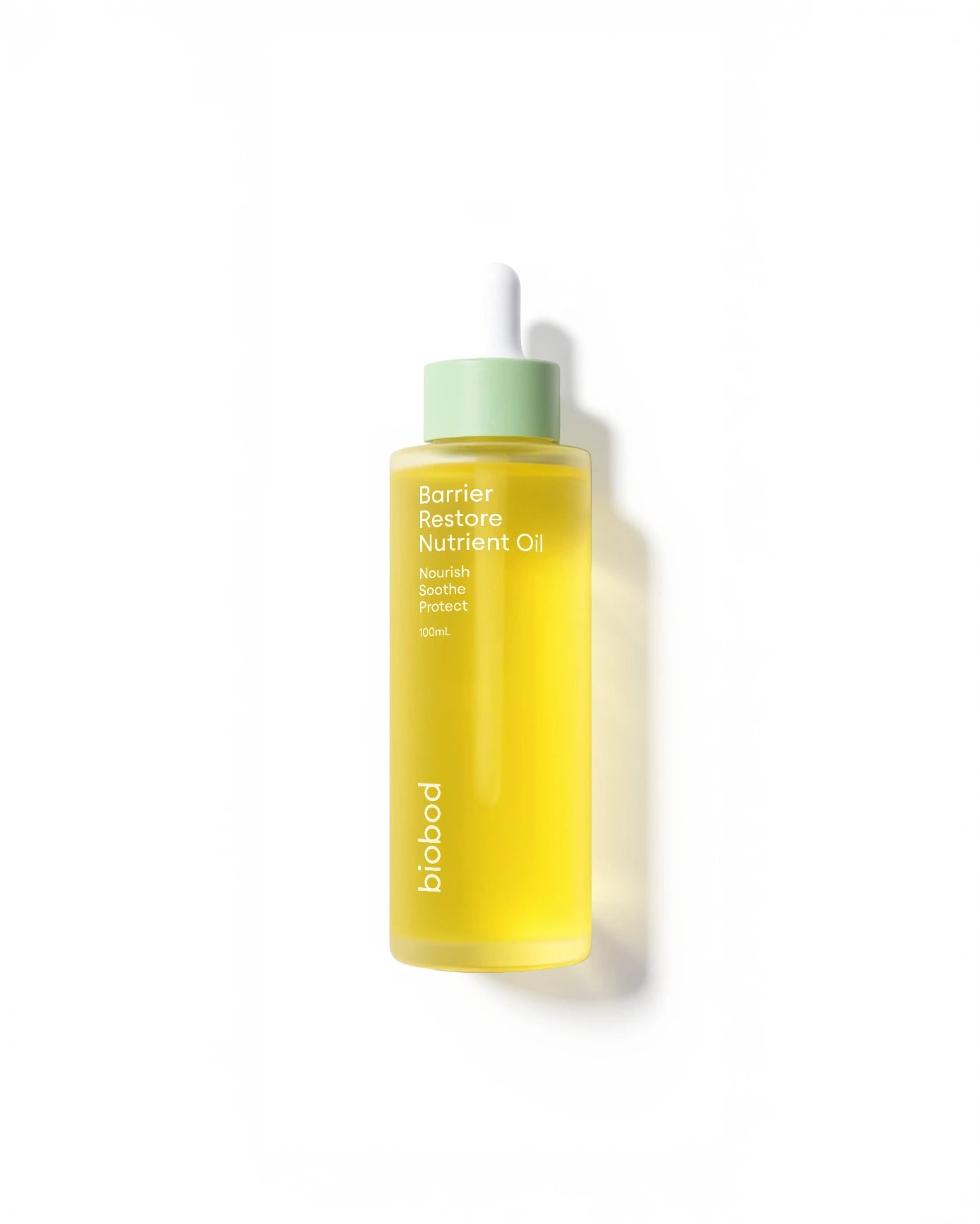 Yellow bottle of face oil for acne prone skin with green cap on a white background, featuring 'Bestseller' label and awards.