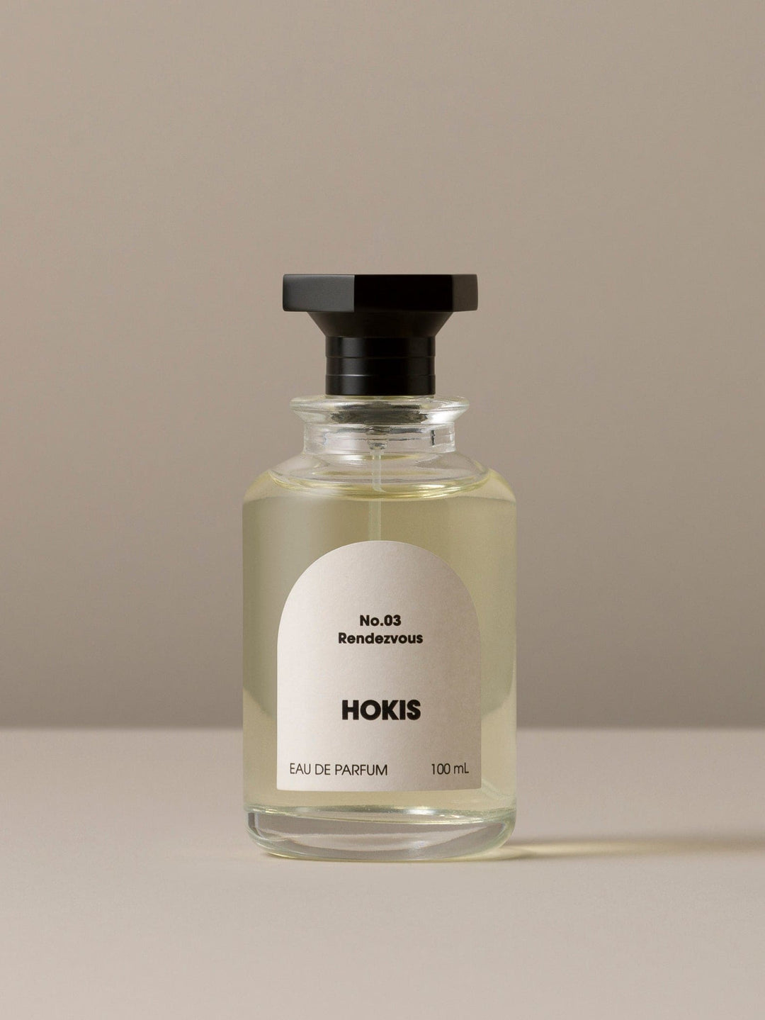 HOKIS No. 03 Rendezvous eau de parfum bottle on a beige background