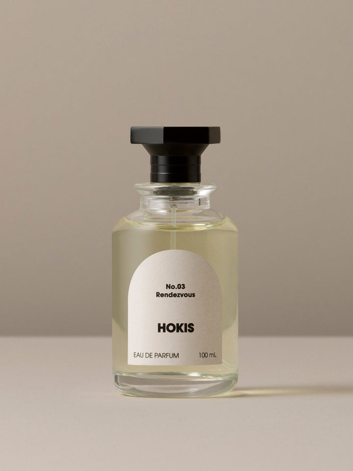HOKIS No. 03 Rendezvous eau de parfum bottle on a beige background