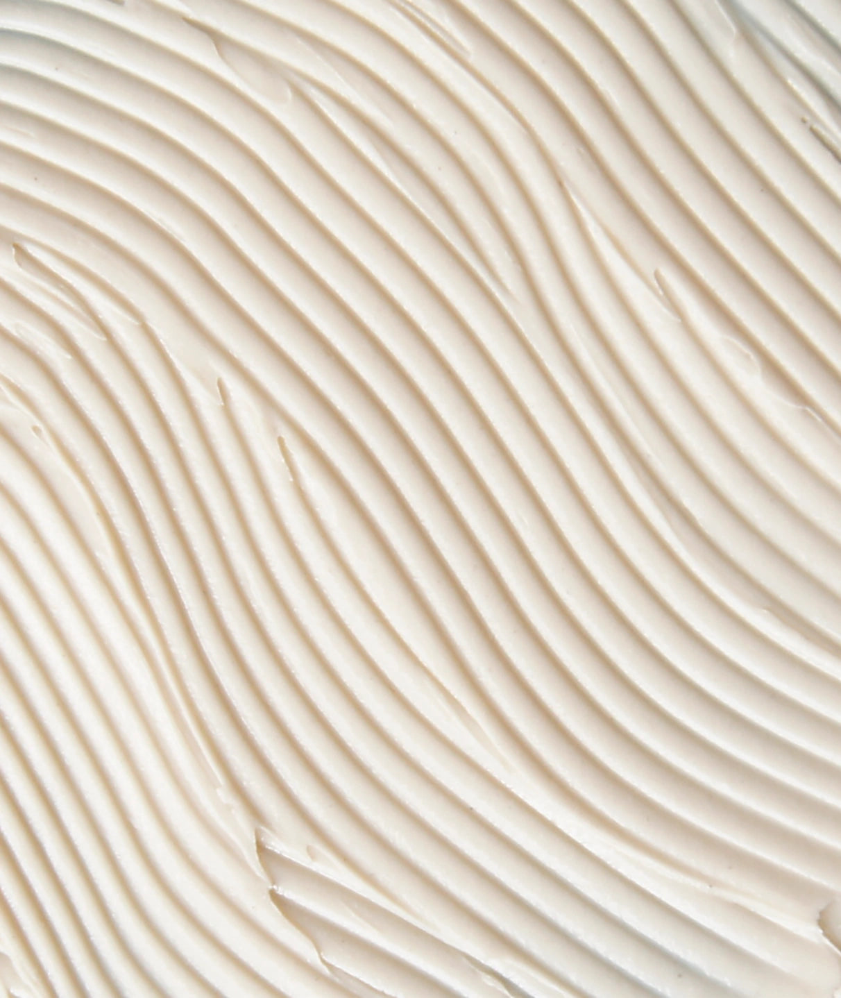 Creamy Enbacci Detoxifying Clay Mask texture with smooth clay swirls, purifying face mask designed to absorb excess oil, unclog pores and balance skin.
