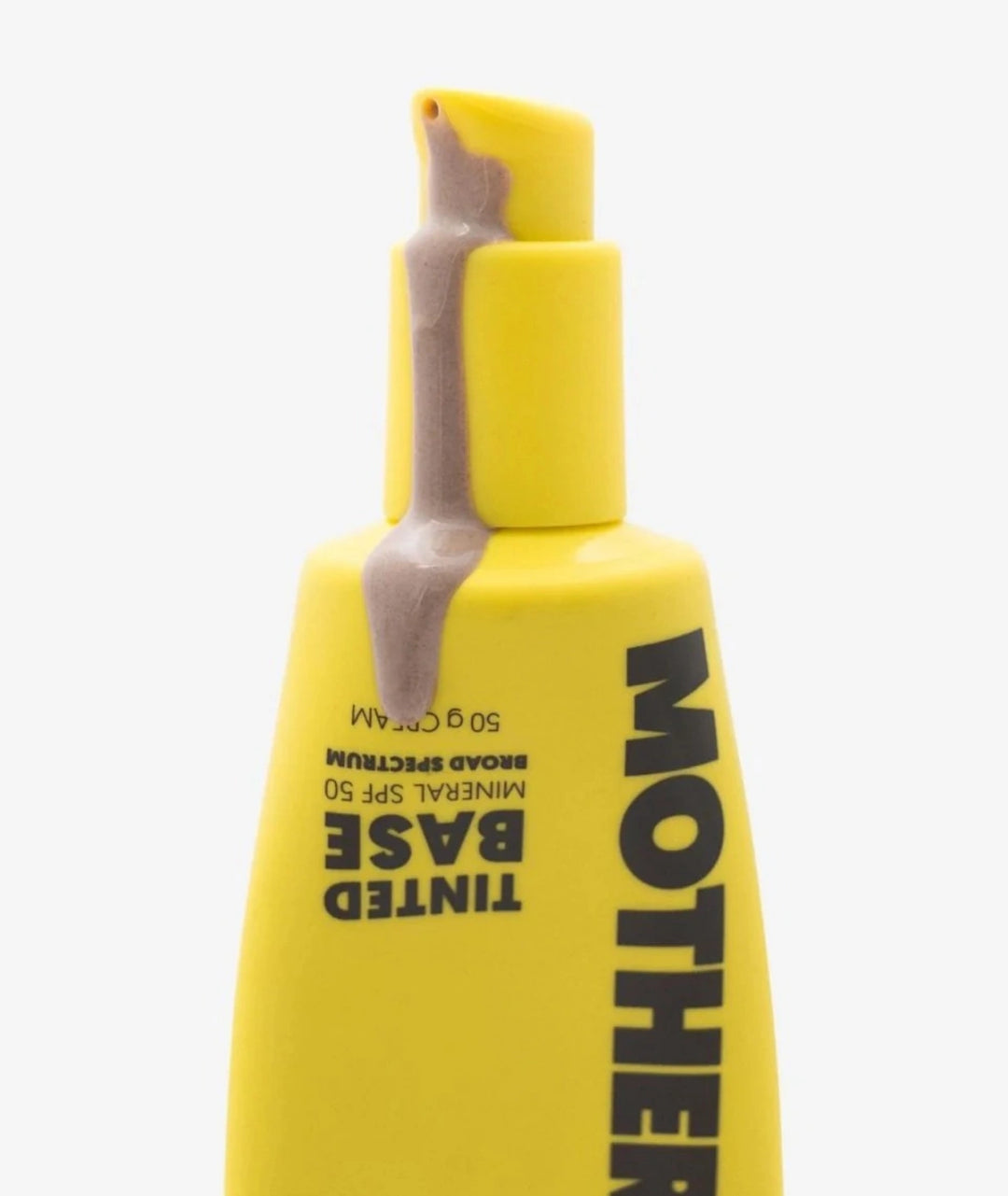 Mother SPF Tinted Base SPF 50 broad-spectrum mineral sunscreen in signature yellow tube with natural tinted formula for lightweight coverage, sun protection and healthy glowing skin.