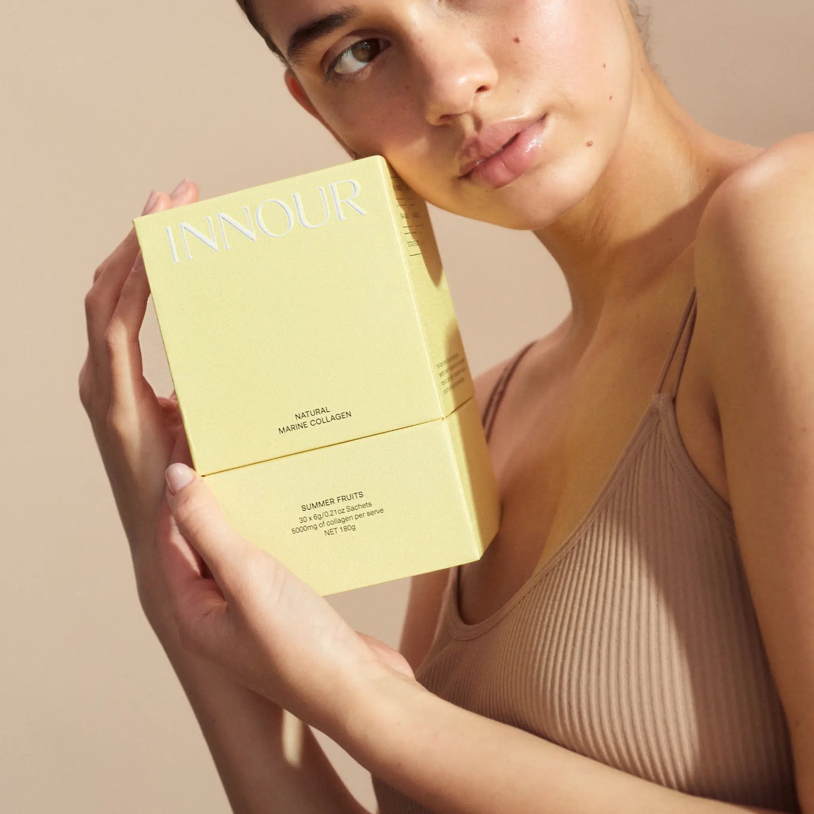 Innour collagen powder in Summer Fruits flavour, featuring premium marine collagen for strong hair, nails and glowing skin.