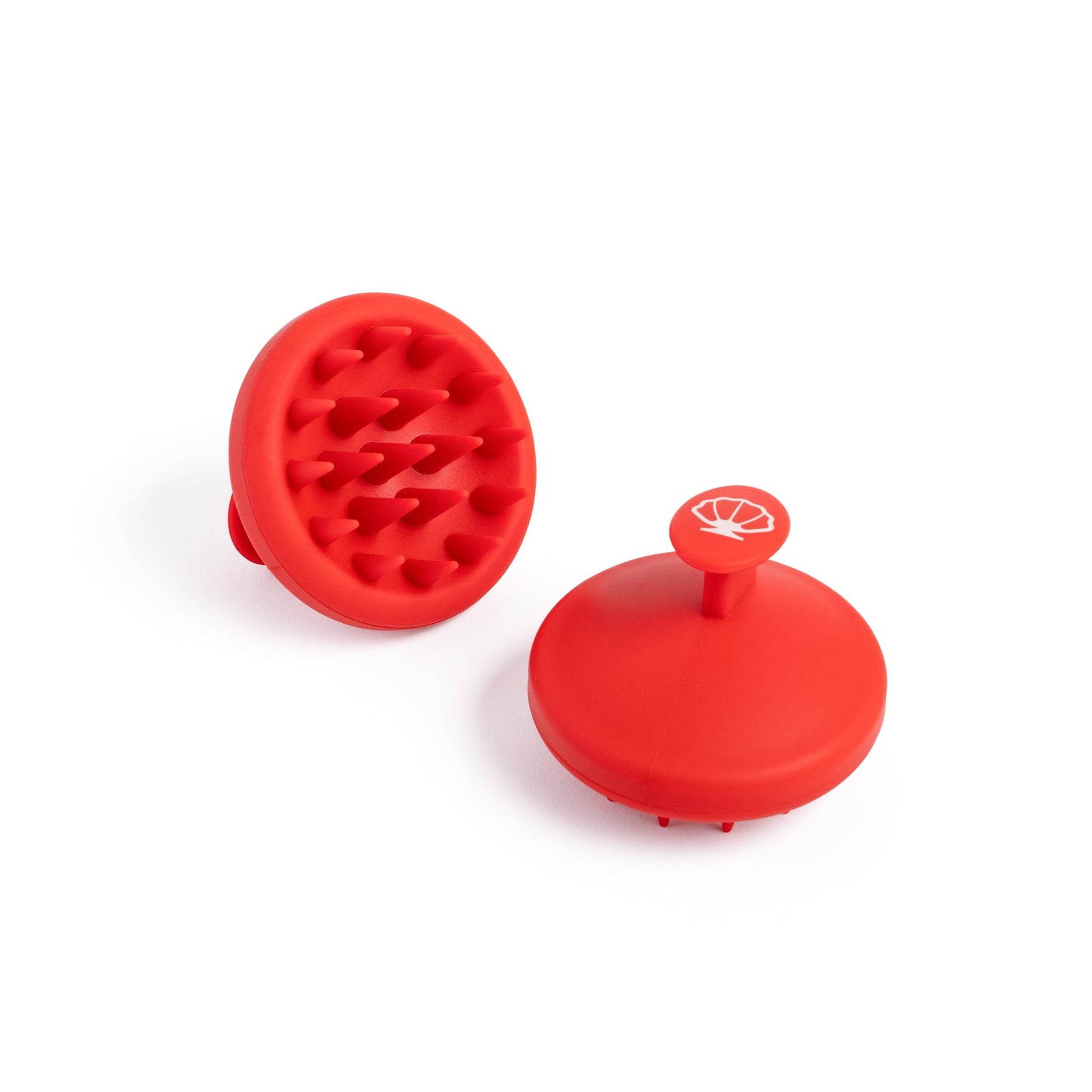 Red scalp hair brush from OVEV Wellness, designed for stimulating hair growth and improving scalp health, ideal for use with hair treatment products. 