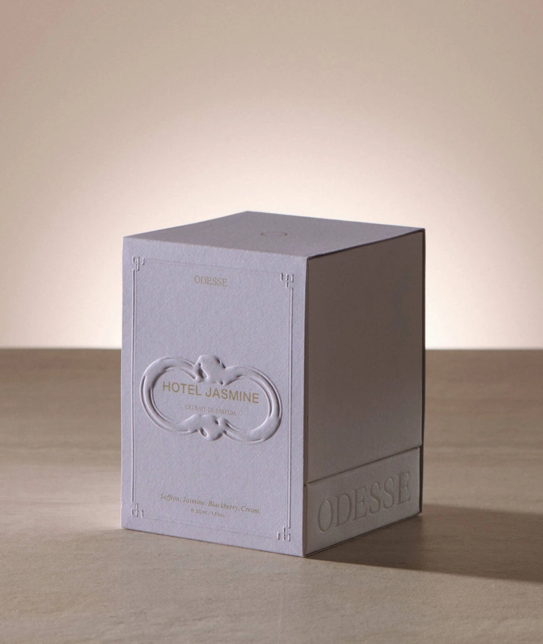 Odesse Hotel Jasmine Extrait de Parfum embossed perfume box packaging, luxury Australian made fragrance featuring jasmine, blackberry, saffron and creamy gourmand notes.