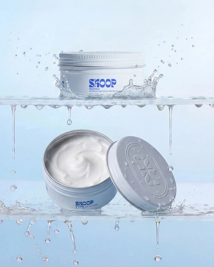 Skoop Hand Hero Antiperspirant Hand Cream with cooling water splash imagery, sweat-control hand moisturiser that helps minimise clammy hands while delivering lightweight hydration and a dry-touch finish.