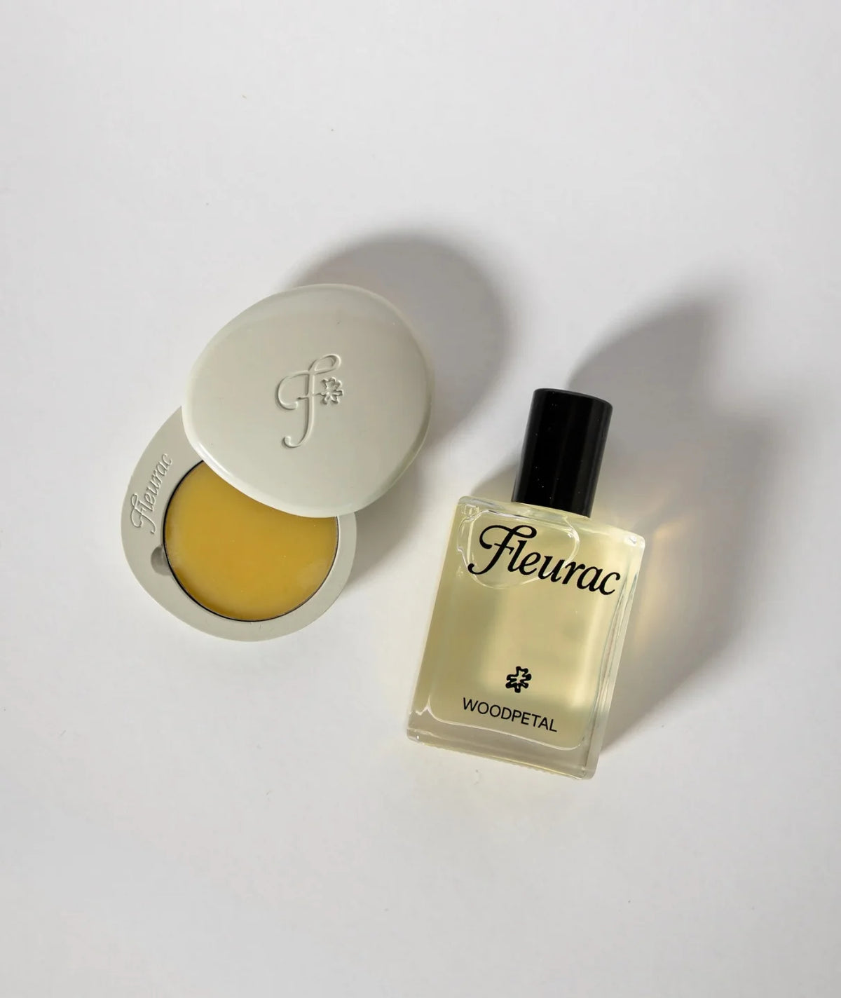 4ml solid perfume balm in a reusable Pebble Compact with perfume oil woodpetal 