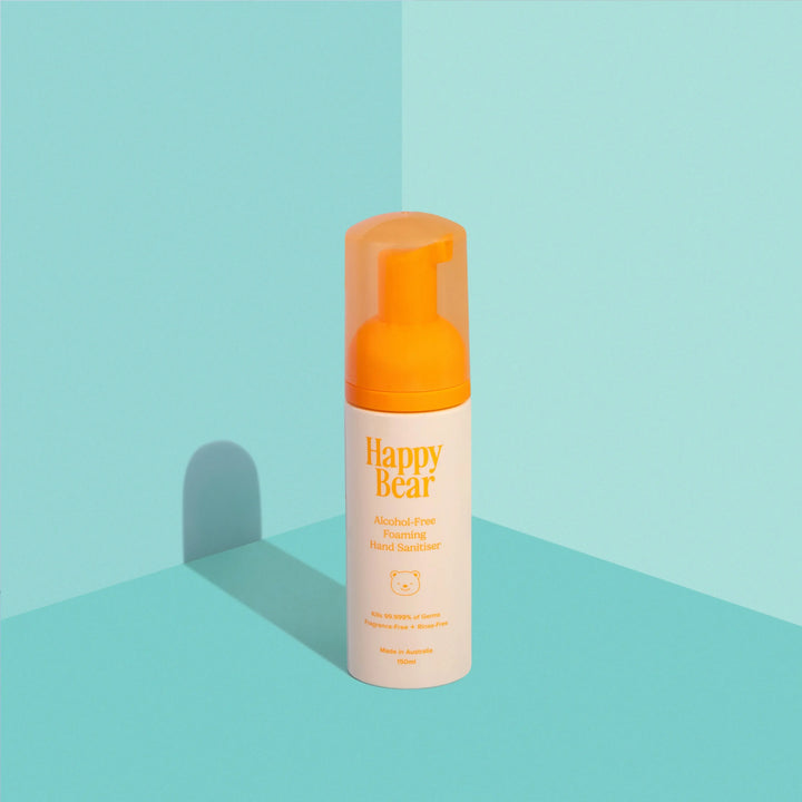 Happy Bear alcohol free foaming hand sanitiser bottle bottle on a light blue background