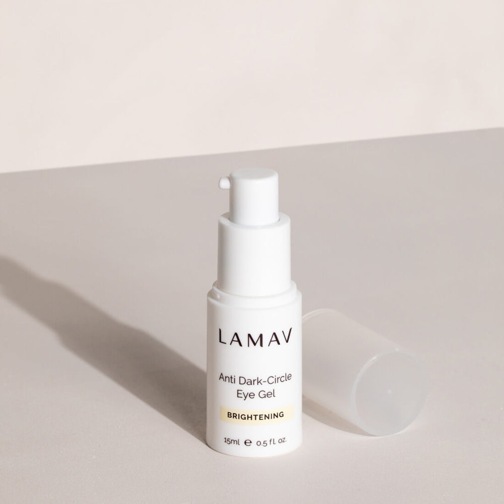 A bottle of LAMAV Anti-Dark-Circle Eye Gel, brightening formula, 15ml, white and minimalistic design, eye gel for Australian beauty care