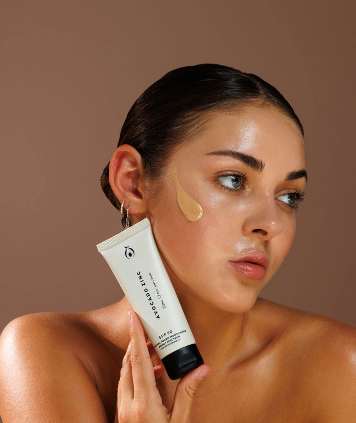 Avocado Zinc SPF 50 Natural Tinted Moisturiser, lightweight mineral sunscreen with natural tint providing broad-spectrum sun protection, hydration and a radiant skin finish.
