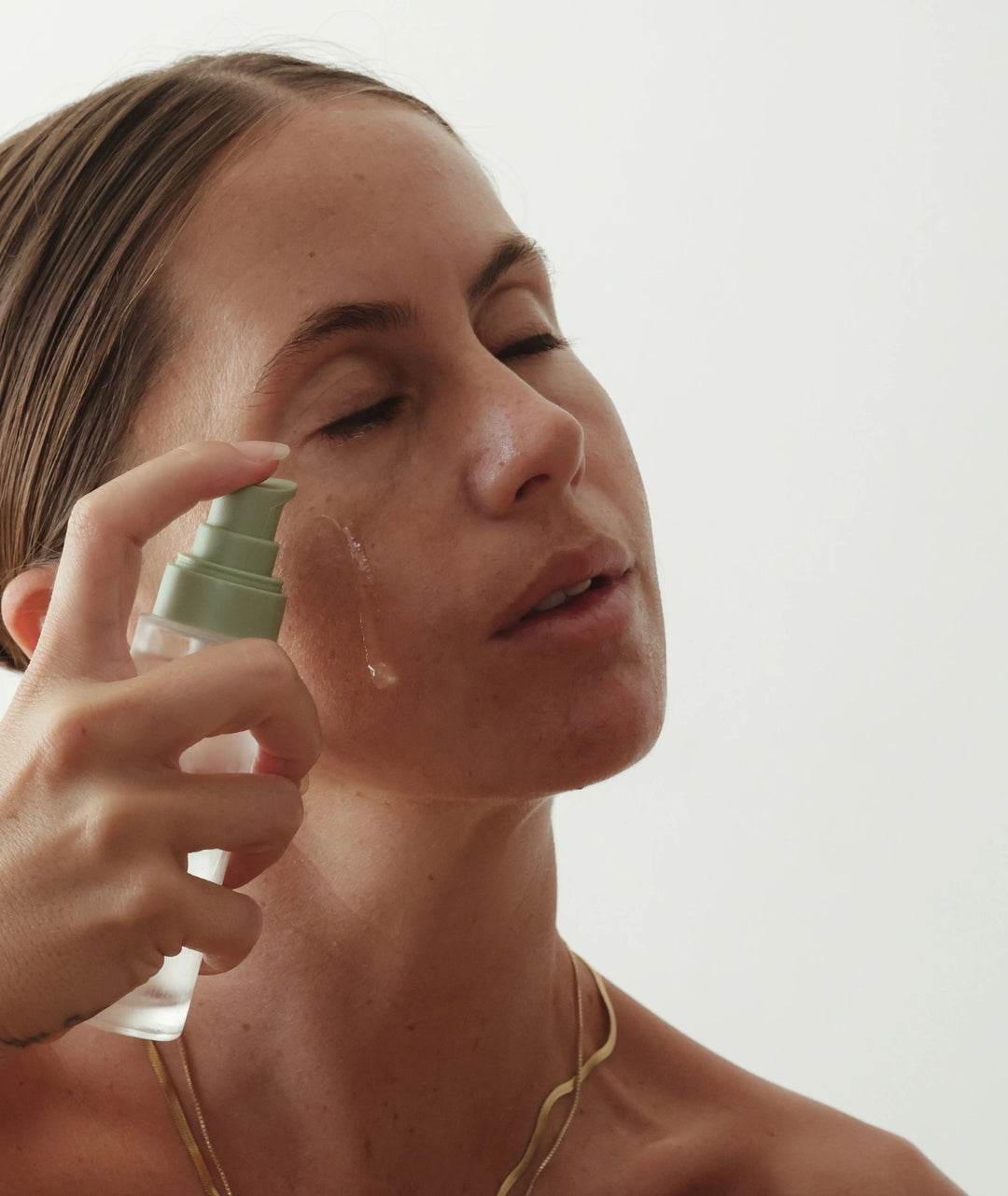 Biobod Replenishing Hydra-Soothe Serum to her face, lightweight oil-free hydrating serum designed to calm redness, support the skin microbiome and restore moisture to sensitive skin.