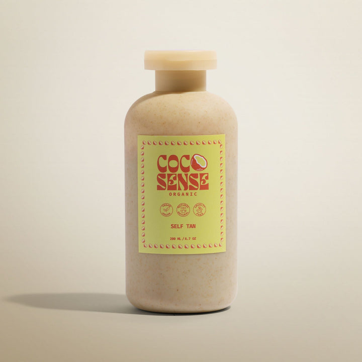 Beige bottle with a yellow label featuring 'Coco Sense' branding on a beige background