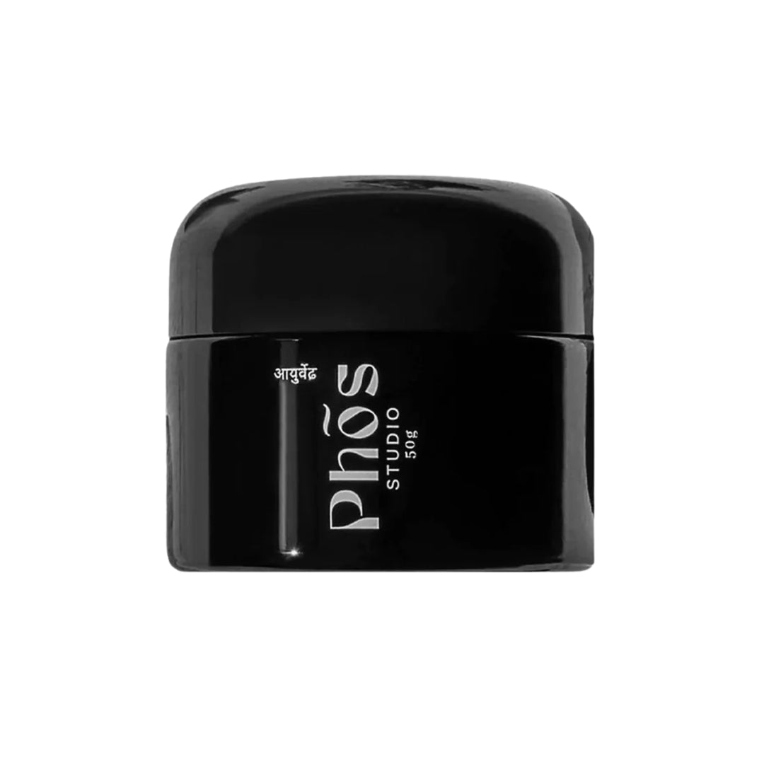 Sleek black jar of Phos Studio night repair cream, with a minimalist design and reflective finish, against a white background. This active skincare product promises better overnight skin care for all skin types.