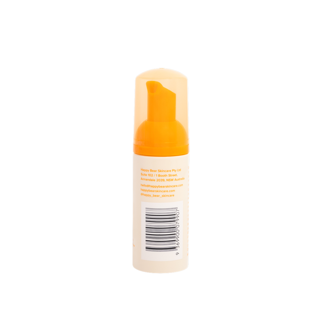 Foam bottle with orange cap on a white background