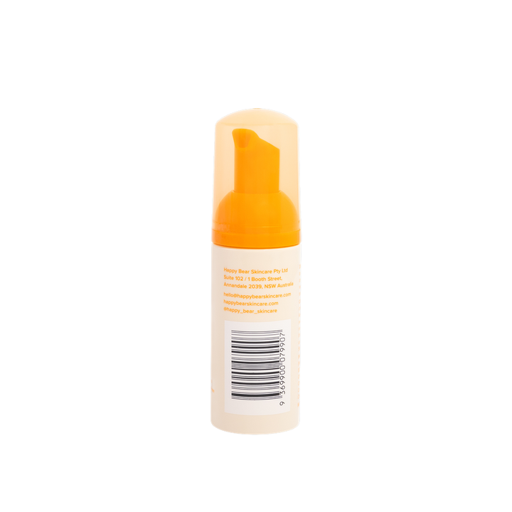 Foam bottle with orange cap on a white background