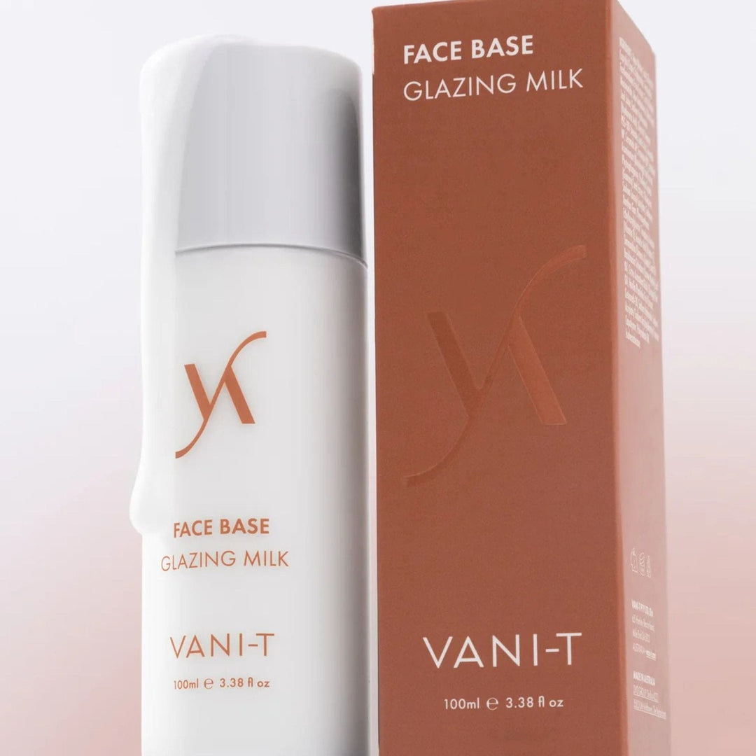 VANI-T Face Base Glazing Milk Australia bottle and packaging on a gradient background