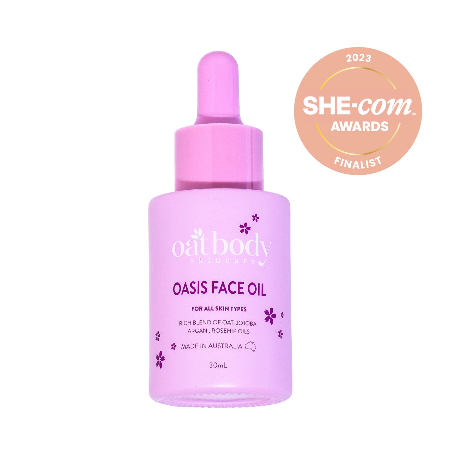 Oatbody Oasis natural facial oil in a pink dropper bottle, labeled as a finalist for the 2023 SHE-Com Awards, featuring a rich blend of oat, jojoba, argan, and rosehip oils, designed for all skin types and made in Australia.