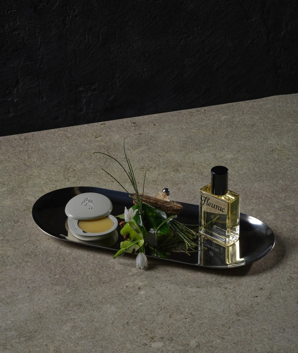 Fleurac Forest Fig perfume oil and solid perfume balm on a metal tray