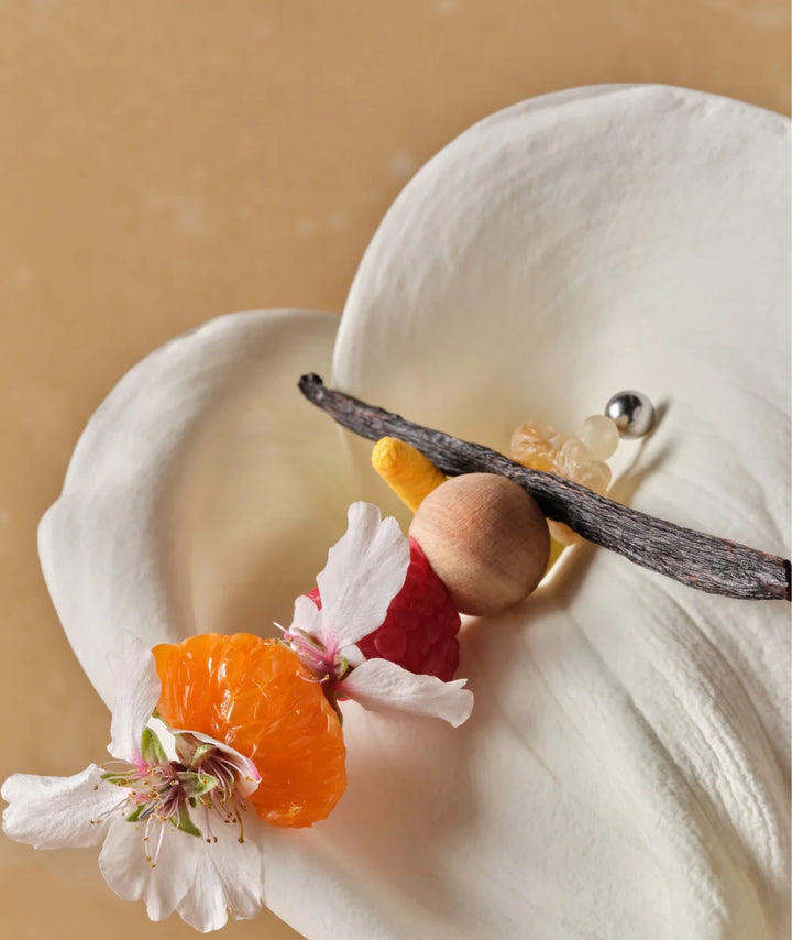 Fleurac Woodpetal Fragrance Notes — Mandarin, raspberry, vanilla bean & wood on white lily | Scent ingredients