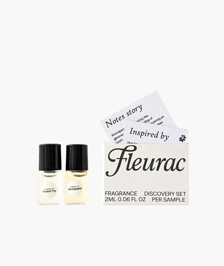 The Fleurac Fragrance Discovery Set includes 2ml perfume oil rollers of Forest Fig and Woodpetal