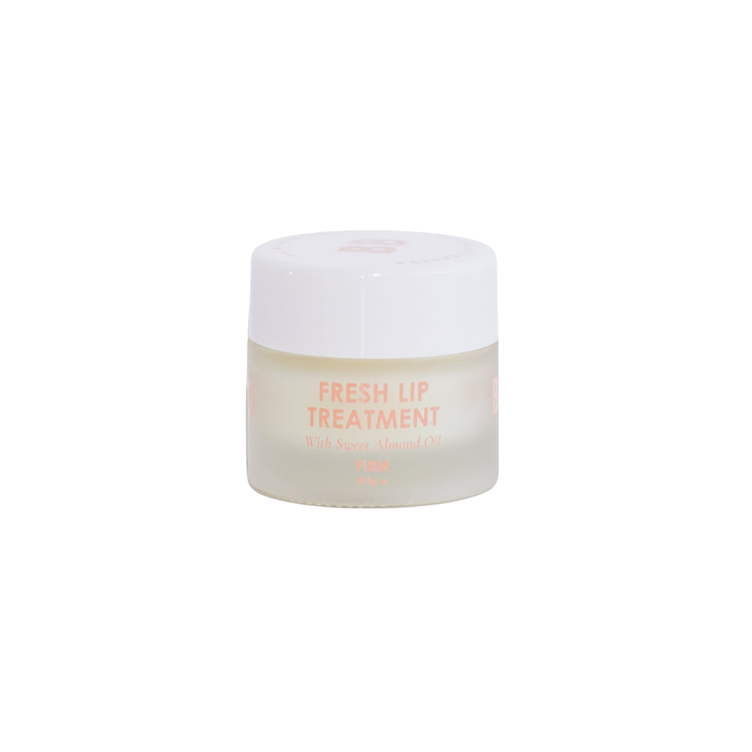 Organic FRESH LIP TREATMENT balm with Sweet Almond Oil, housed in a minimalist white jar, from an Australian online beauty shop for nourishing lip care.