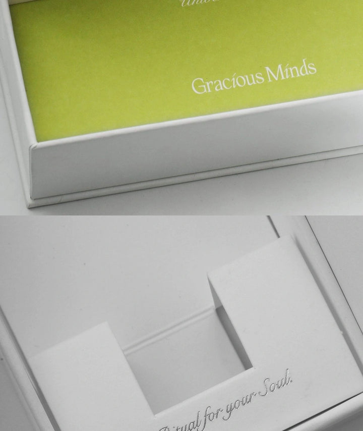 Interior of Gracious Minds packaging showing a green insert and Ritual for your Soul text.