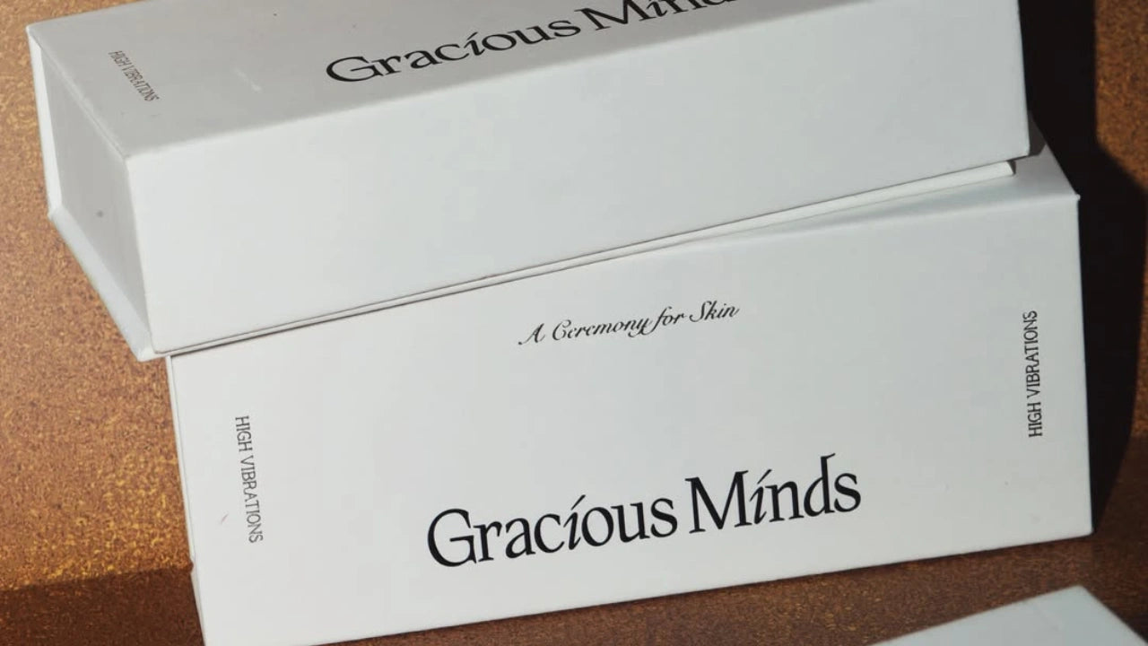 Gracious Minds Australian skincare boxes on a warm bronze background, available at VAMS Beauty