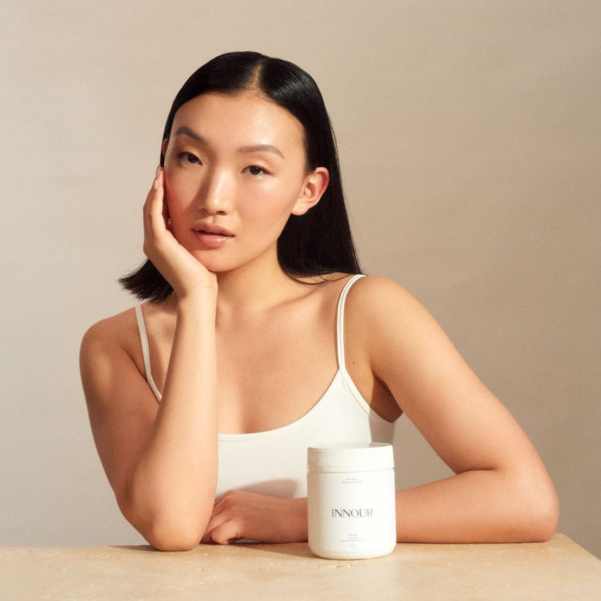 Woman with glowing skin beside Innour Marine Collagen powder supporting skin hydration, hair and nail wellness at VAMS Beauty Australia
