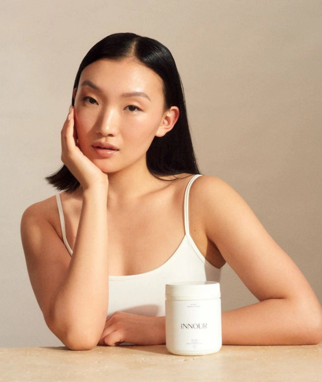 Lifestyle beauty portrait featuring Innour Natural Marine Collagen 150g, highlighting beauty-from-within support for radiant skin and daily wellness.