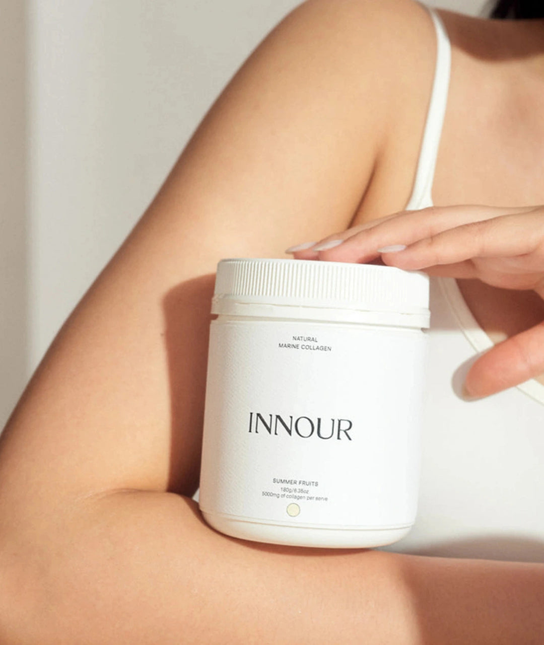 Innour Natural Marine Collagen Summer Fruits 180g lifestyle image showcasing premium marine collagen powder for skin hydration, hair and beauty support.
