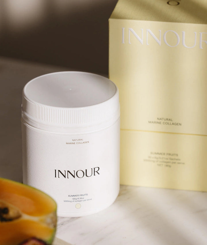 Innour Natural Marine Collagen Summer Fruits 180g with packaging and fresh fruit, premium Australian marine collagen supplement for beauty from within.