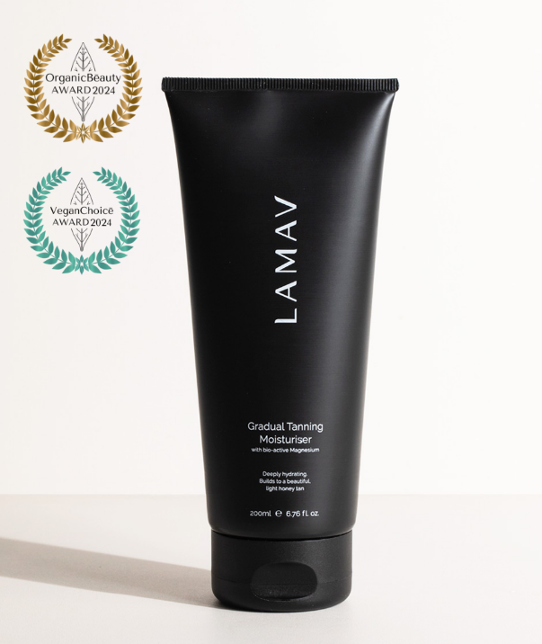 Award-winning LAMAV Gradual Tanning Moisturiser displaying 2024 Organic Beauty and Vegan Choice badges.