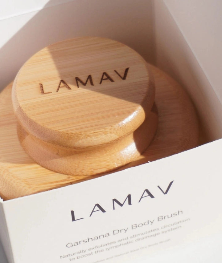 LAMAV Garshana Dry Body Brush resting inside its open white packaging box.