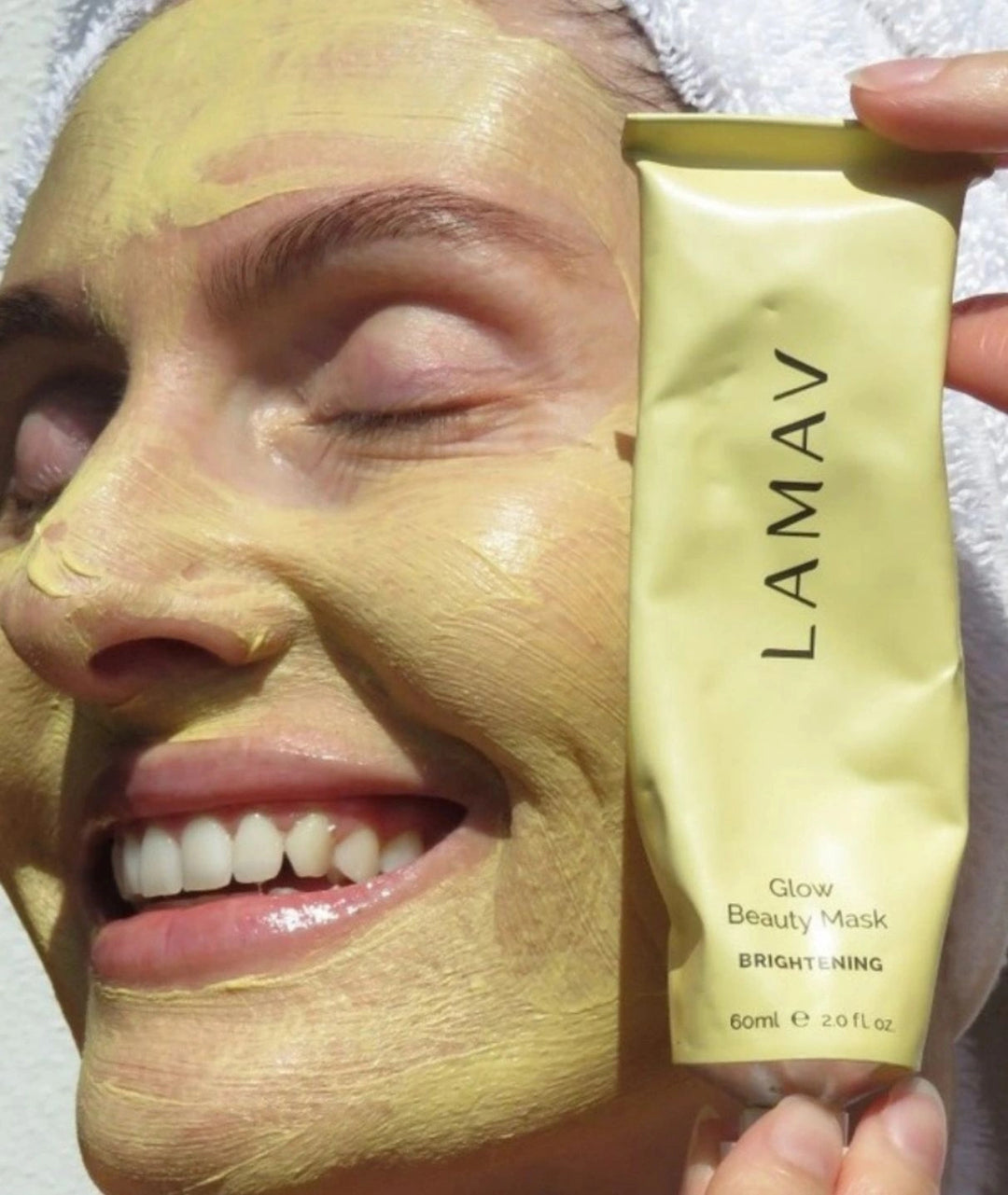 Close-up of LAMAV Glow Beauty Mask applied to skin. Natural brightening skincare