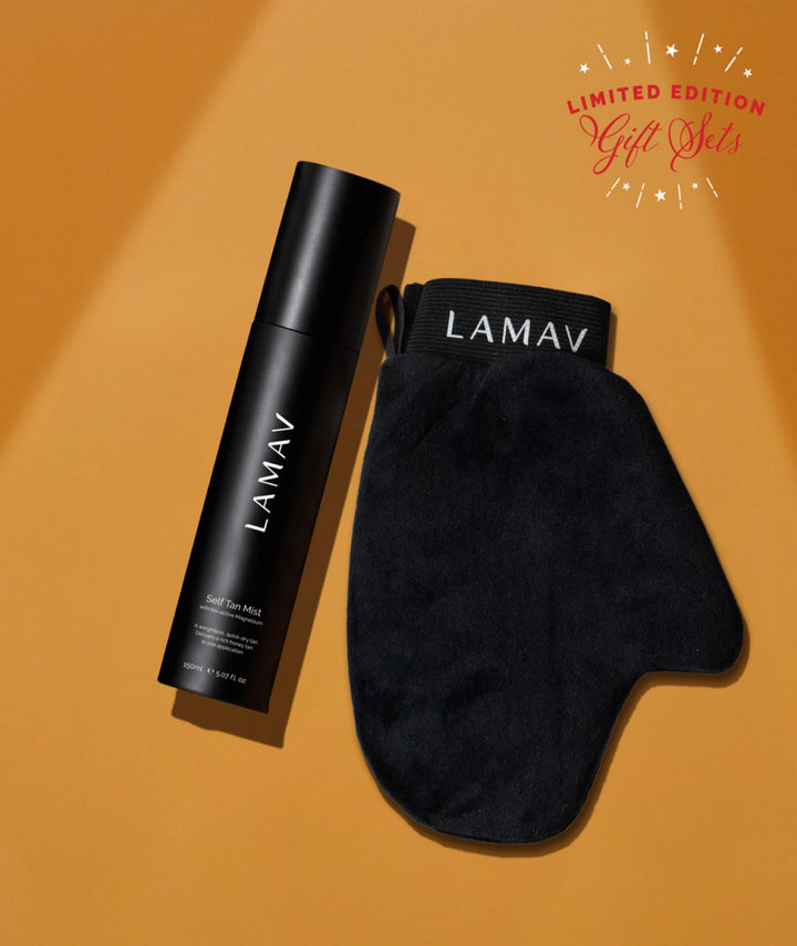 LAMAV Glow on the Go limited edition gift set. Self Tan Mist and tanning mitt on an orange background.