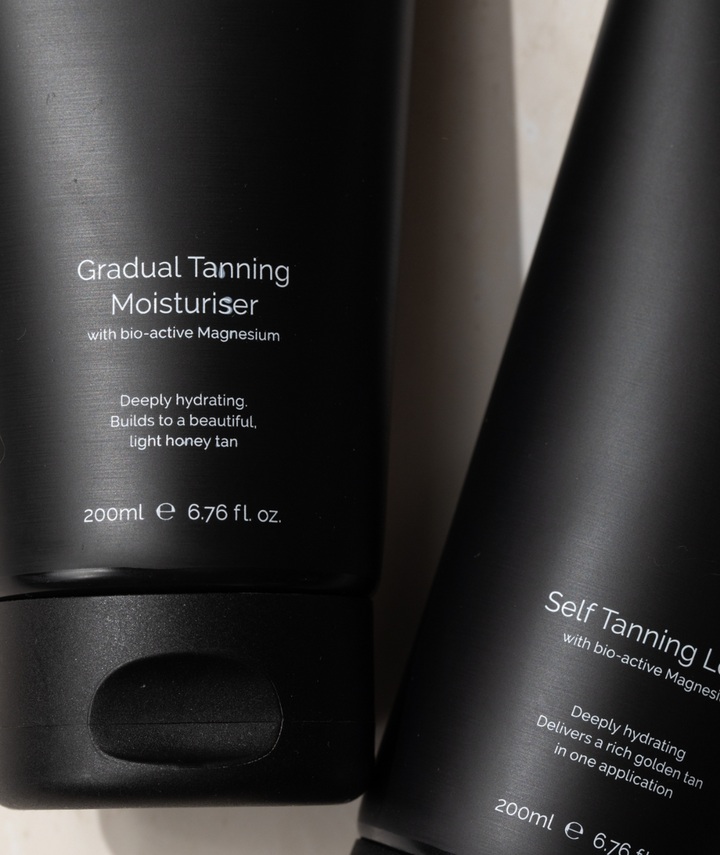 Close-up of LAMAV Gradual Tanning Moisturiser label highlighting bio-active Magnesium for a light honey tan.