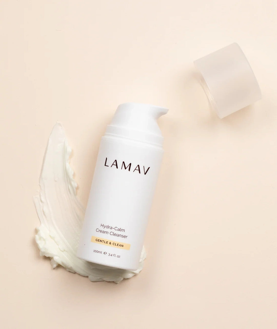 LAMAV Hydra-Calm Cream Cleanser bottle with creamy texture swatch. Gentle daily skincare