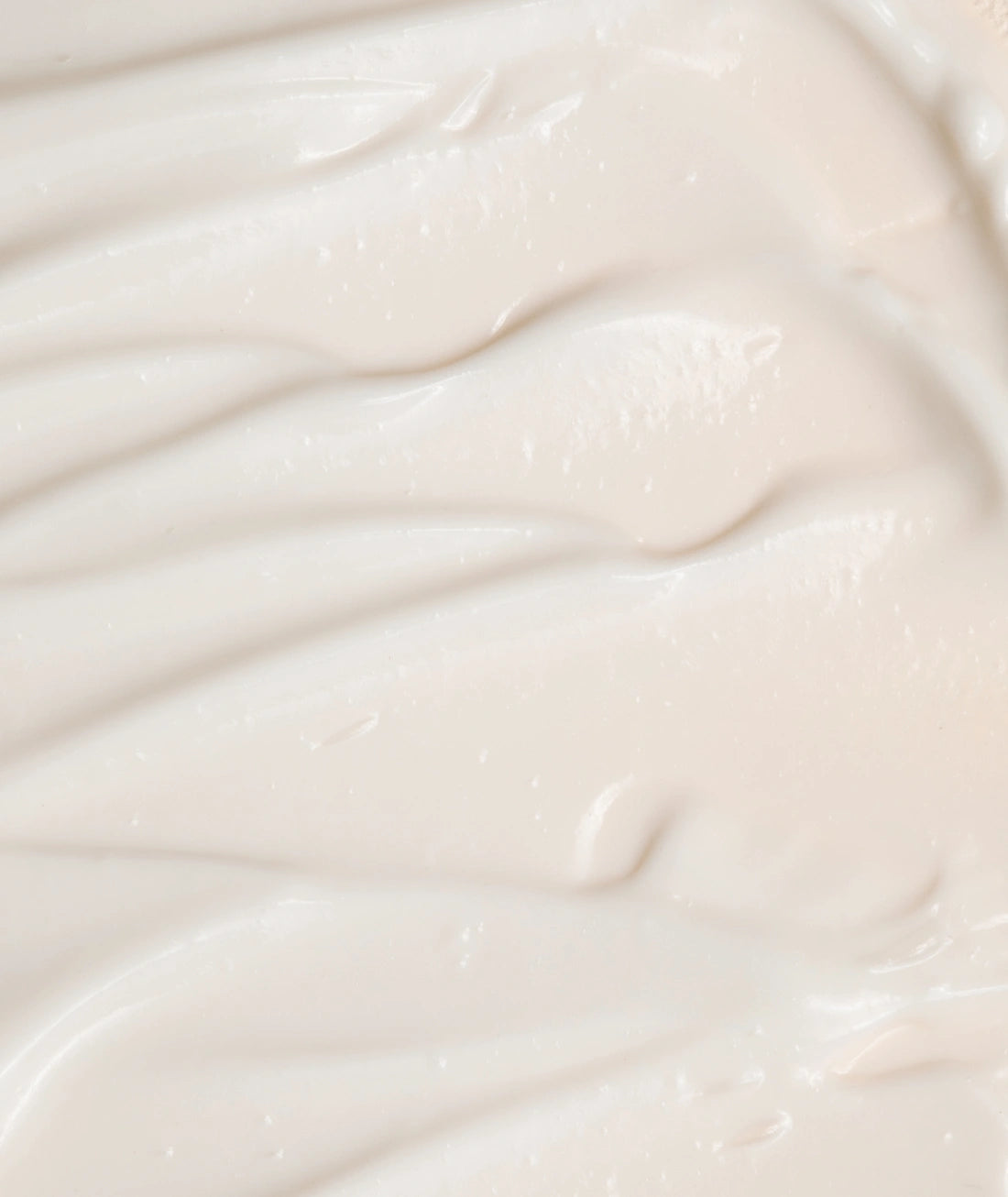 Close-up macro texture of the creamy LAMAV Omega-3 Advanced Night Cream.
