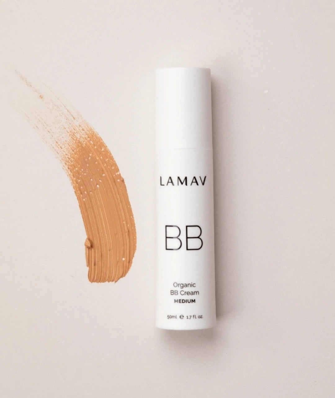 LAMAV Organic BB Cream bottle in shade Medium next to a product swatch on a light background.