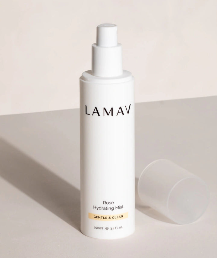 LAMAV Rose Hydrating Mist 100ml. Gentle and clean facial toner spray bottle with cap off on a minimalist surface.