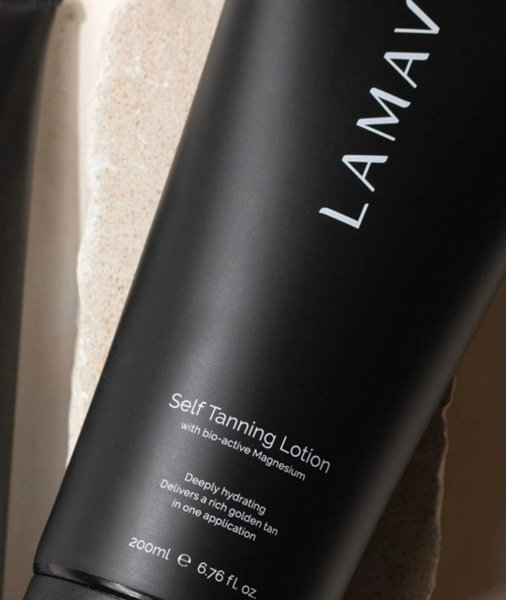 Close-up of LAMAV Self Tanning Lotion label highlighting bio-active magnesium.
