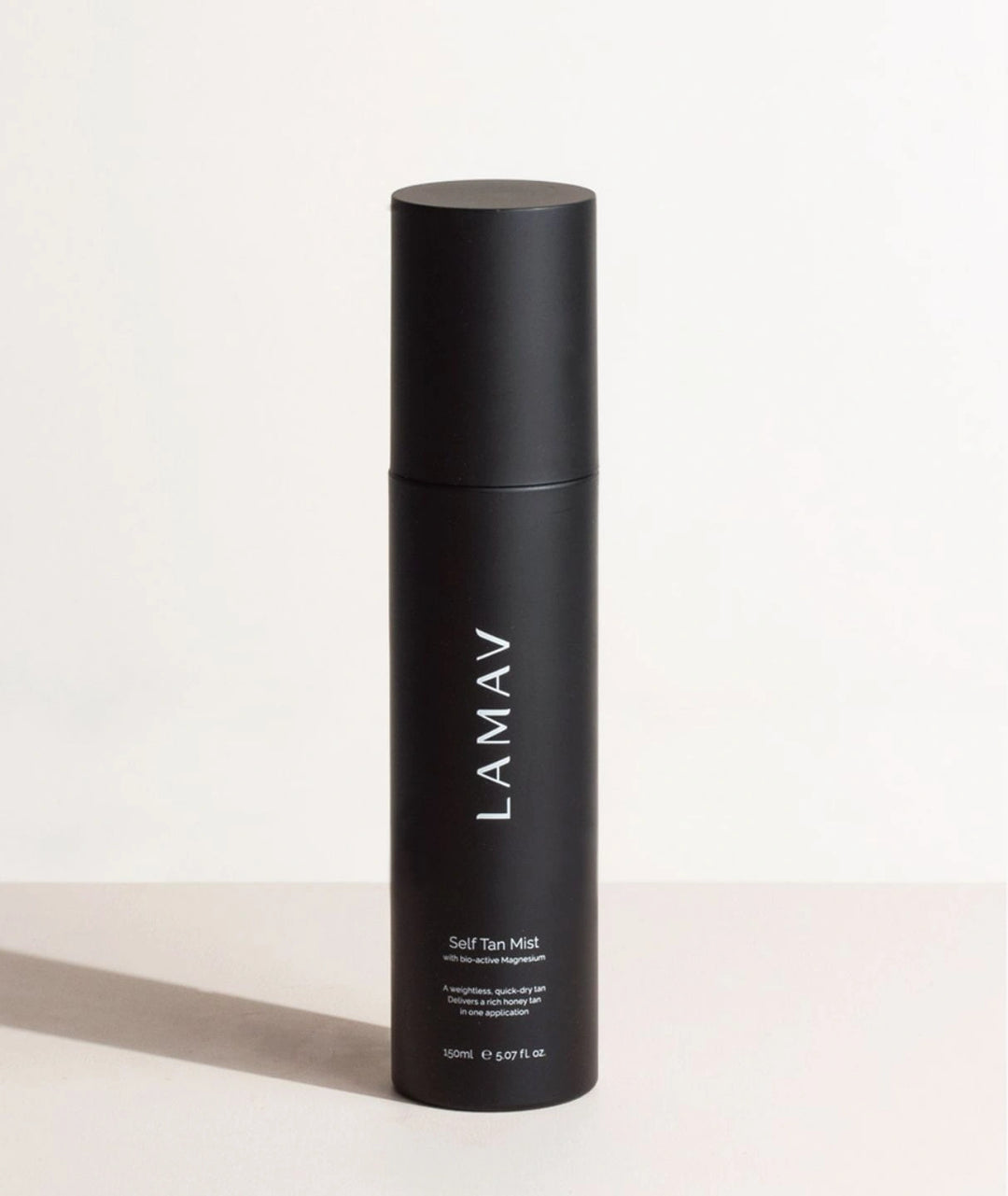 Front view of the 150ml LAMAV Self Tan Mist bottle with its cap securely on.