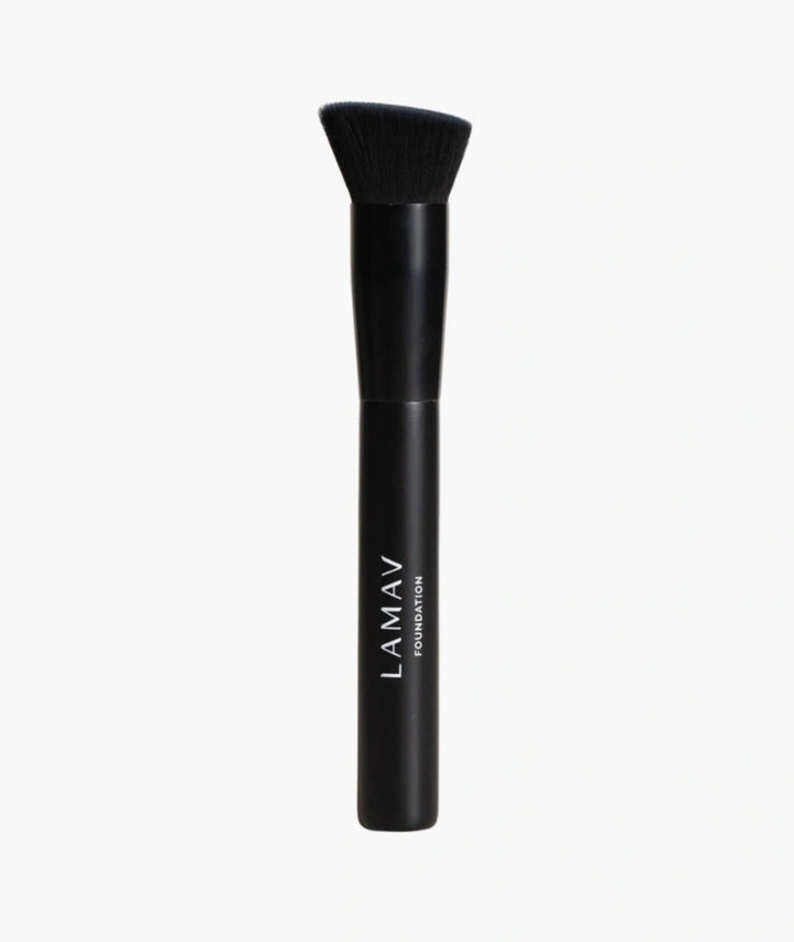 LAMAV Vegan Foundation Brush isolated on white. Black cruelty-free angled makeup brush for flawless liquid application.
