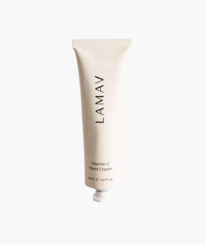 LAMAV Vitamin C Hand Cream 60ml isolated on white. Hydrating anti-aging hand lotion in a squeeze tube.