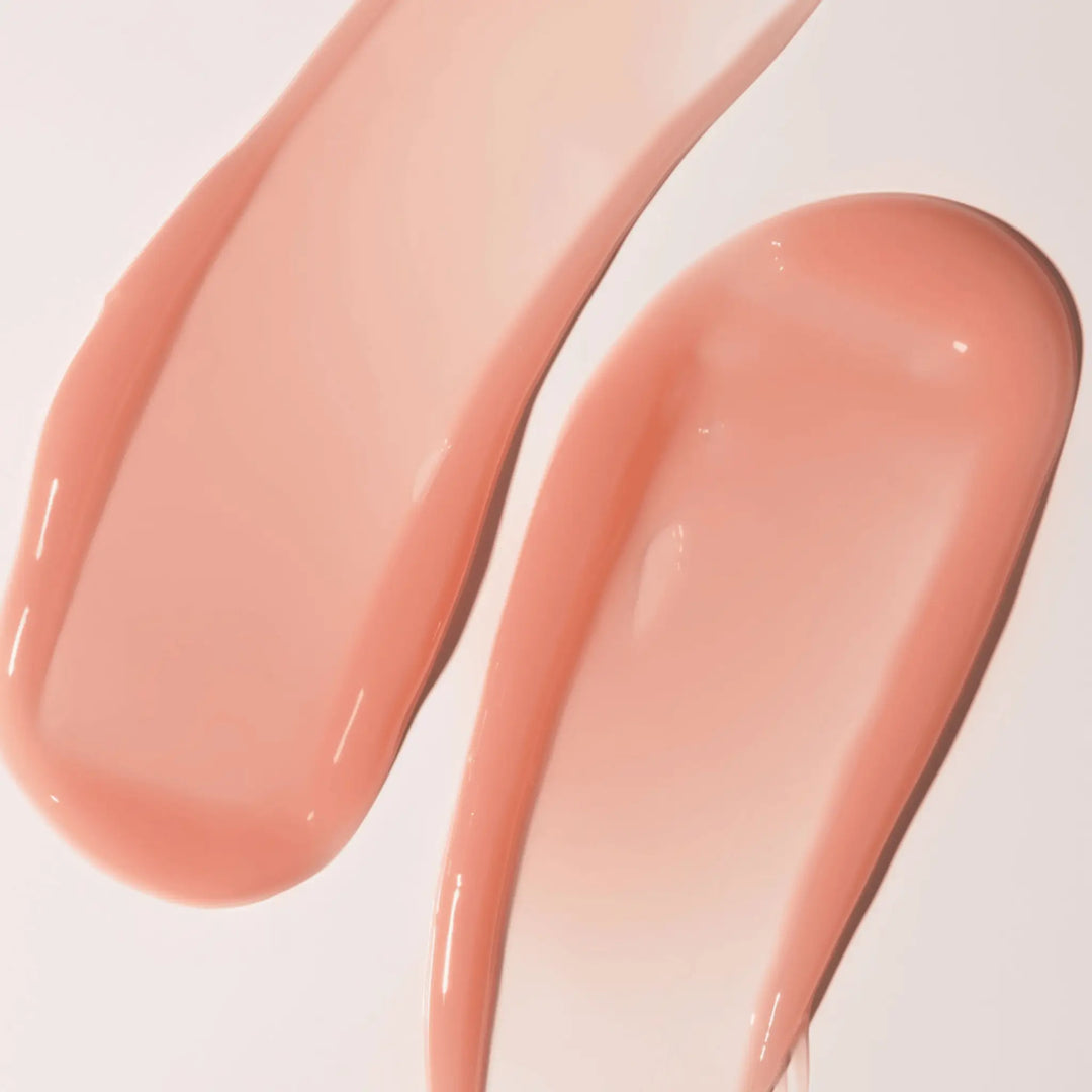 Close-up texture swatch of VANI-T Lip Glaze Sheer Lip Gloss, showcasing its hydrating, glossy finish for natural lip enhancement. Available at VAMS Beauty, your source for Australian lip care products.