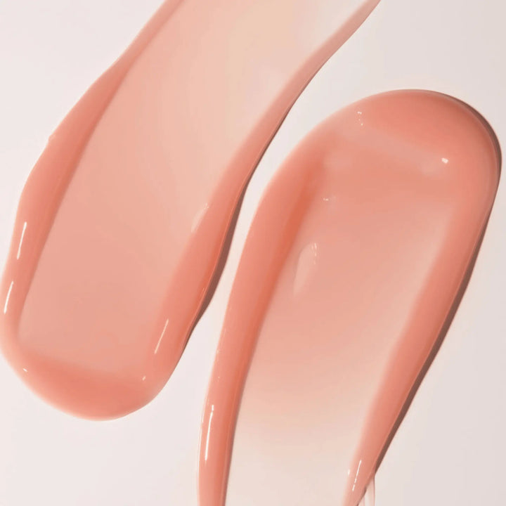 Close-up texture swatch of VANI-T Lip Glaze Sheer Lip Gloss, showcasing its hydrating, glossy finish for natural lip enhancement. Available at VAMS Beauty, your source for Australian lip care products.
