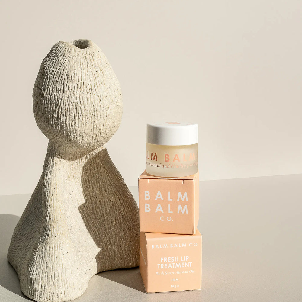Organic FRESH LIP TREATMENT balm with Sweet Almond Oil, housed in a minimalist white jar, from an Australian online beauty shop for nourishing lip care.