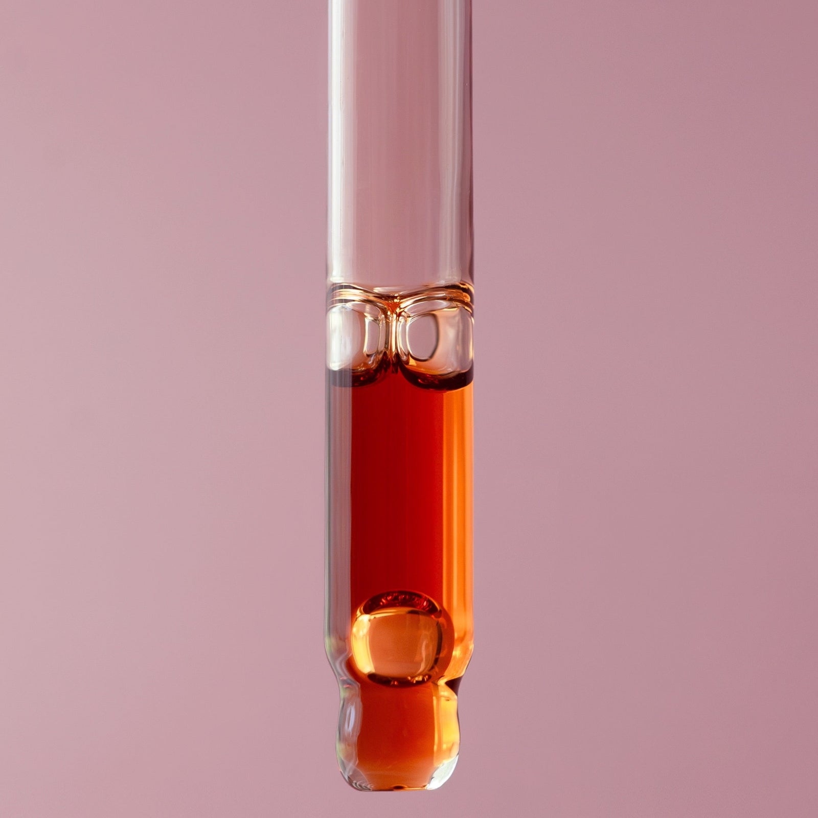 hair oil dropper infused with rosemary oil for hair growth